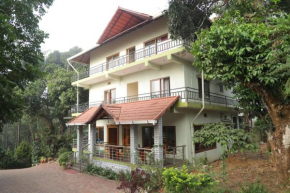 Whispering woods by Aura hospitality